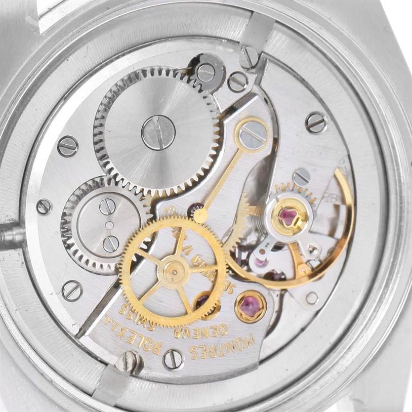 This image shows the intricate mechanical movement of the Vintage Collection model by Rolex, viewed from the back of the watch.