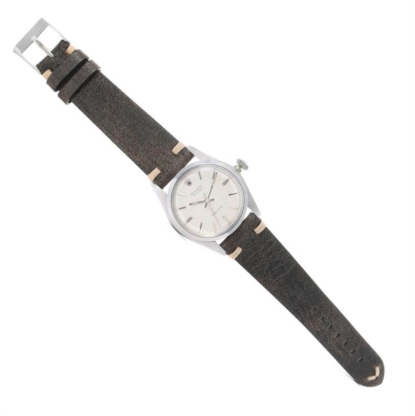 This image shows a Vintage Collection Rolex watch at an angled top-down view, displaying its face, band, and buckle.