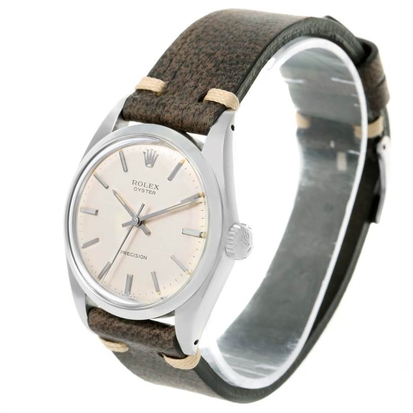 The image shows a side view of the Rolex Vintage Collection 6426 Men's Stainless Steel Silver Dial 6426 Men's Stainless Steel Silver Dial model watch, displaying the dial, crown, and leather strap.