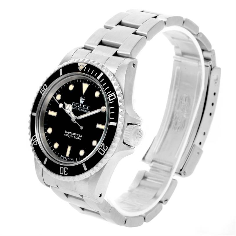 The image shows a side angle view of the Rolex Vintage Collection 5513 Men's Black Dial 5513 Men's Black Dial watch, displaying the dial, bezel, crown, and part of the bracelet.