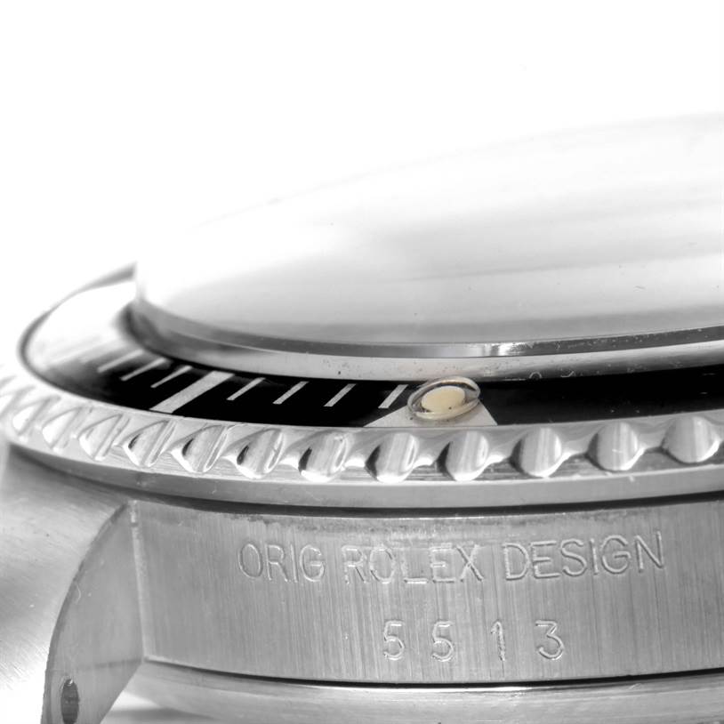 The image shows a close-up side angle of the bezel, crystal, and part of the case of the Rolex Vintage Collection 5513 Men's Black Dial 5513 Men's Black Dial model 5513.