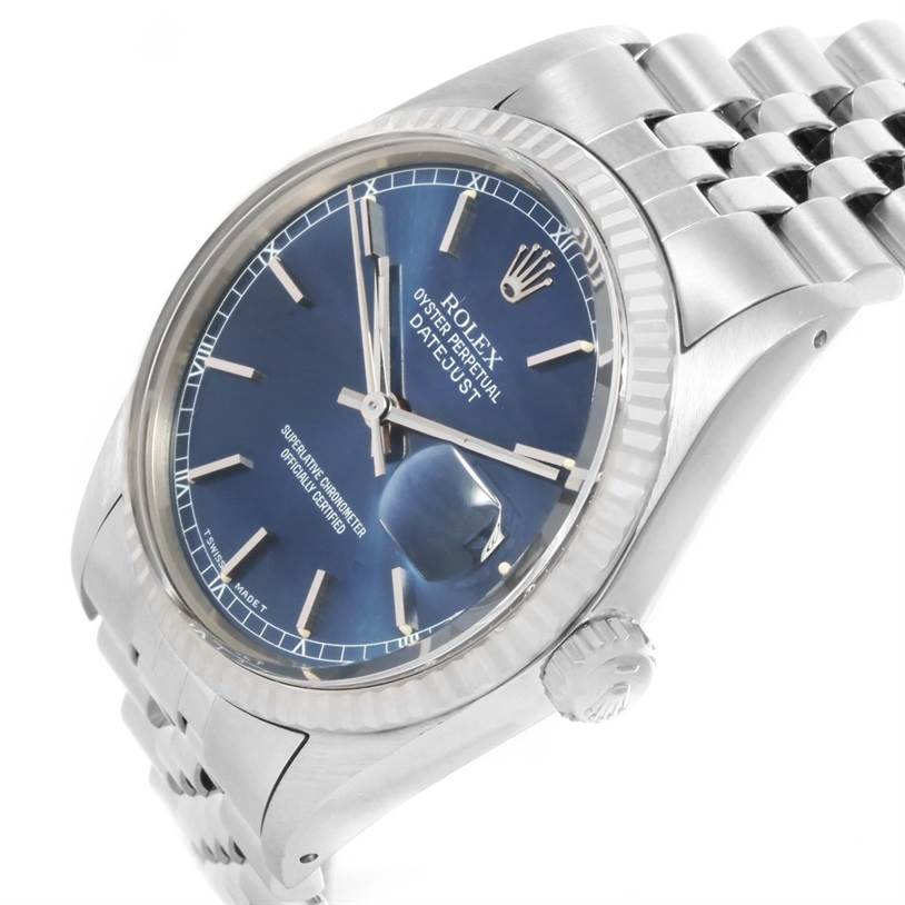 The image shows a Rolex Vintage Collection 16014 Men's Stainless Steel Silver Dial 16014 Men's Stainless Steel Silver Dial watch, angled to display the blue dial, fluted bezel, and part of the bracelet.