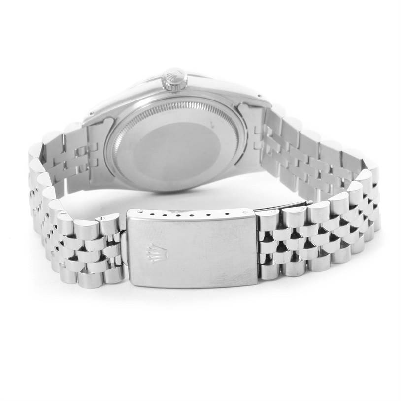 This image shows the back view of the Rolex Vintage Collection 16014 Men's Stainless Steel Silver Dial 16014 Men's Stainless Steel Silver Dial watch, focusing on the case back and metal bracelet.