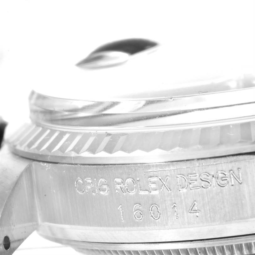 This image shows a close-up side view of the Vintage Collection Rolex watch, focusing on the bezel and case with model number 16014.