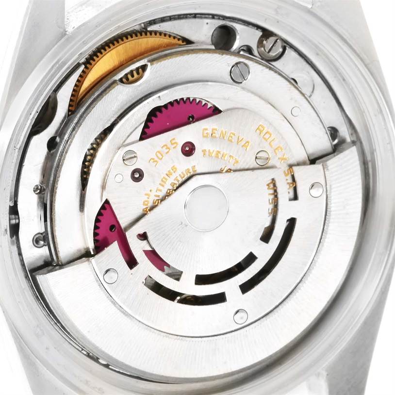 The image displays the inner mechanics and movement of the Rolex Vintage Collection 16014 Men's Stainless Steel Silver Dial 16014 Men's Stainless Steel Silver Dial watch from a rear view angle.