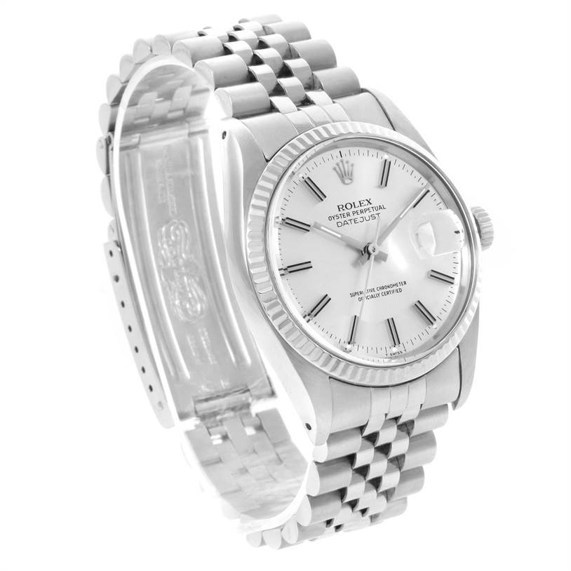 The image shows a Rolex Oyster Perpetual Datejust from the Vintage Collection at an angled view, highlighting the dial, bezel, and bracelet.