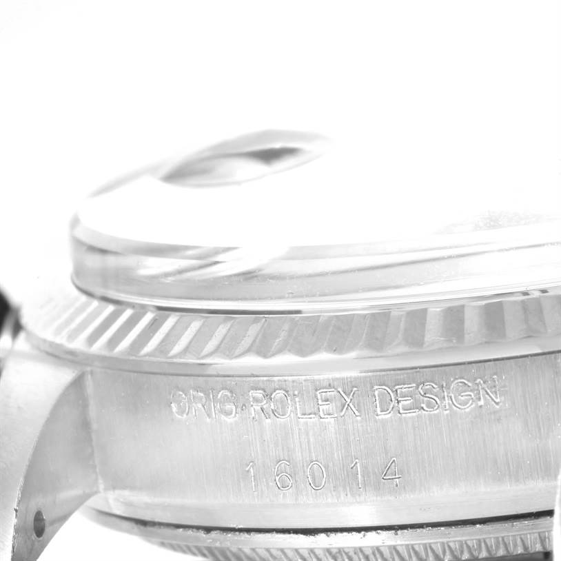 The image shows a close-up of the side of a Vintage Collection Rolex watch, highlighting the engraved model number and the bezel.