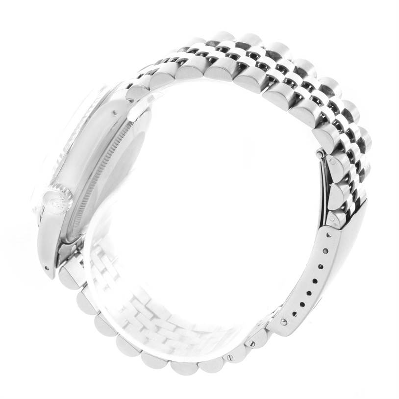 This image shows a side angle of the Rolex Vintage Collection 16014 Men's Stainless Steel Silver Dial 16014 Men's Stainless Steel Silver Dial watch, highlighting its case and metal bracelet.