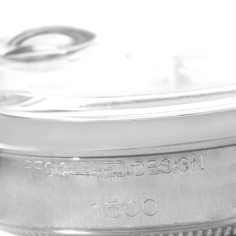 This close-up image shows the side of a Rolex Vintage Collection 1500 Men's Stainless Steel Silver Dial 1500 Men's Stainless Steel Silver Dial watch, highlighting the "Registered Design 1500" engraving.