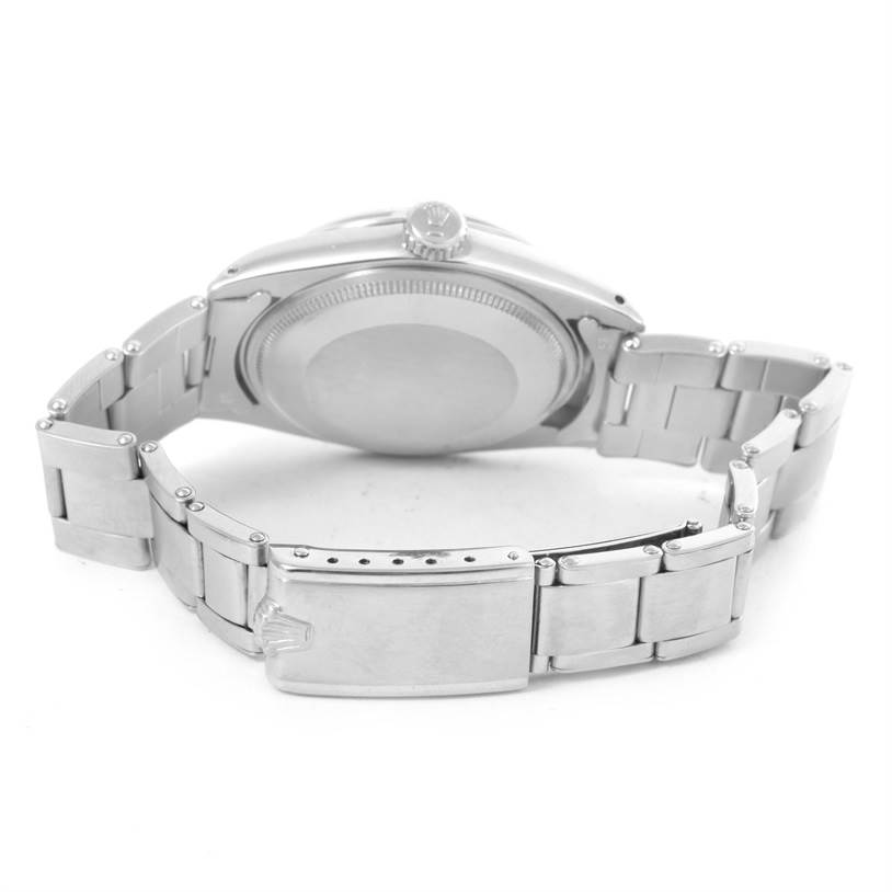 This image shows the back and clasp of a Rolex Vintage Collection 1500 Men's Stainless Steel Silver Dial 1500 Men's Stainless Steel Silver Dial watch, highlighting the bracelet and caseback.