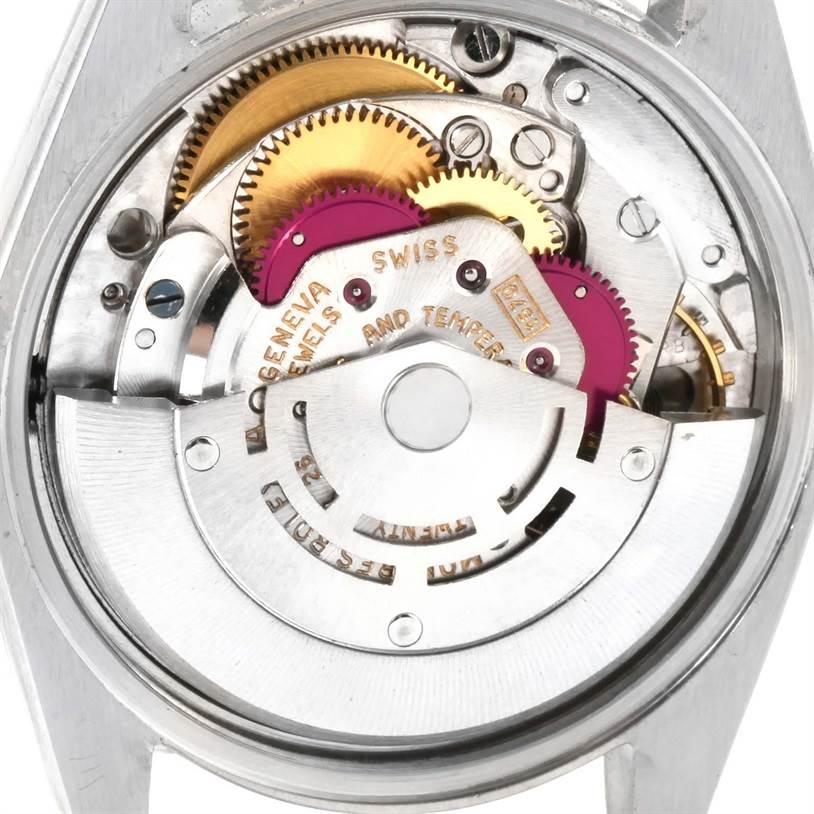 This image shows the internal mechanism of the Rolex Vintage Collection 1500 Men's Stainless Steel Silver Dial 1500 Men's Stainless Steel Silver Dial model, highlighting its gears and rotors from a rear view.