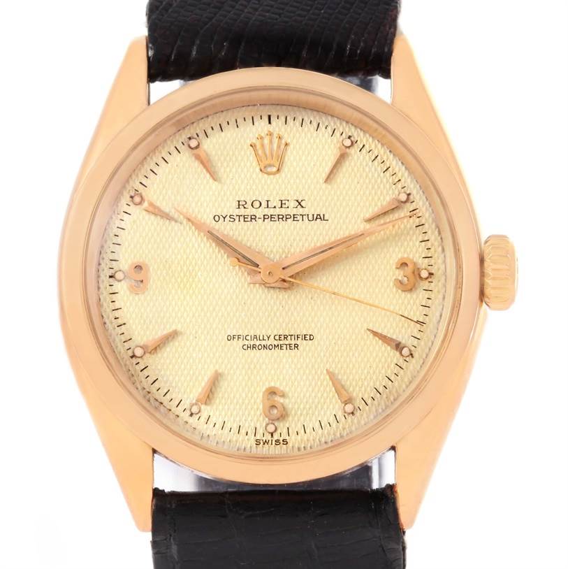 The image shows a front view of the Rolex Vintage Collection 6284 Men's Rose Gold Silver Dial 6284 Men's Rose Gold Silver Dial Oyster-Perpetual watch, highlighting its dial, hands, bezel, and strap attachment.