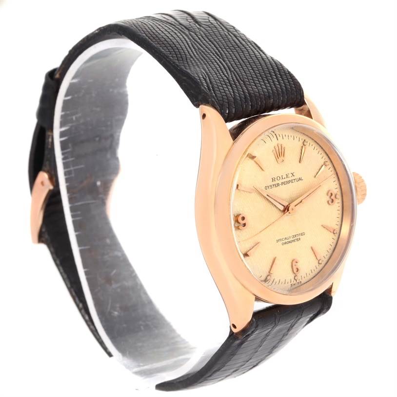 The image shows a side angle view of the Rolex Vintage Collection 6284 Men's Rose Gold Silver Dial 6284 Men's Rose Gold Silver Dial watch, featuring the case, dial, and black strap.