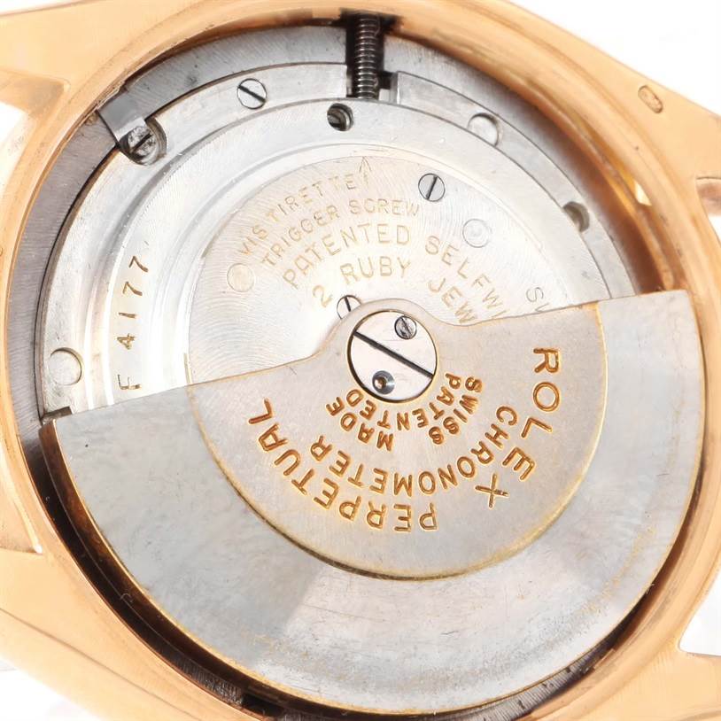 The image shows the movement of a Rolex Vintage Collection 6284 Men's Rose Gold Silver Dial 6284 Men's Rose Gold Silver Dial watch from a close-up, internal angle, highlighting the rotor and inner components.