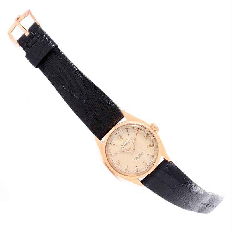 The Rolex Vintage Collection 6284 Men's Rose Gold Silver Dial 6284 Men's Rose Gold Silver Dial model watch is shown at an angle displaying the entire face, case, and black leather strap.