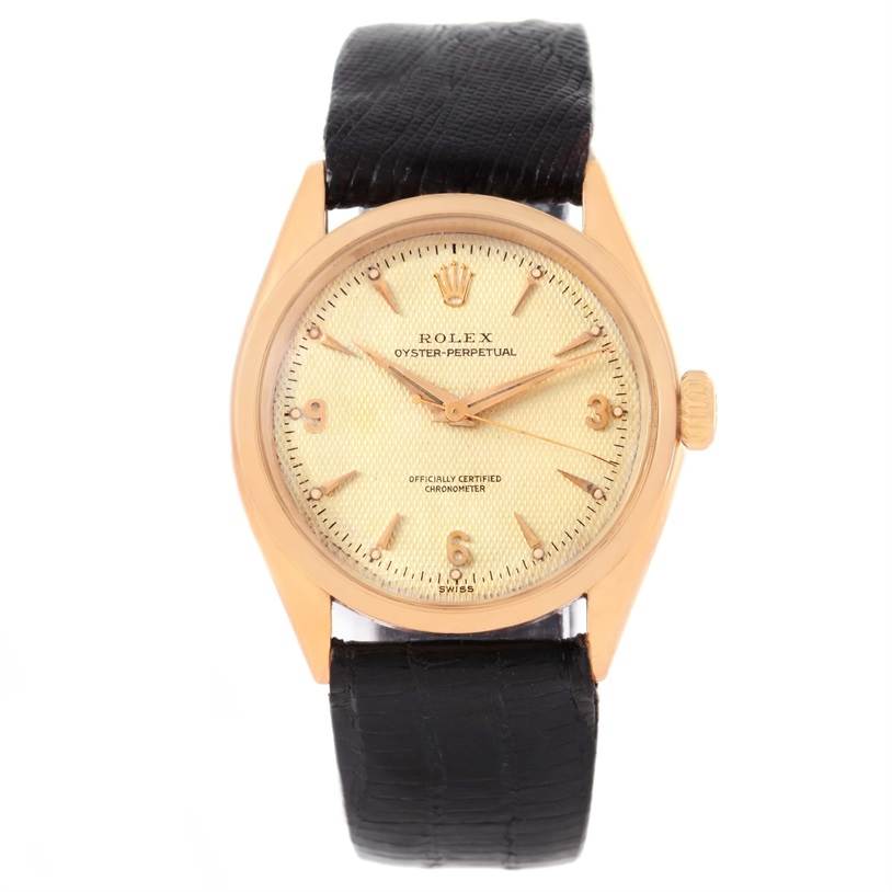 This Rolex Vintage Collection 6284 Men's Rose Gold Silver Dial 6284 Men's Rose Gold Silver Dial watch is shown from the front, displaying its face, hands, crown, and leather strap.