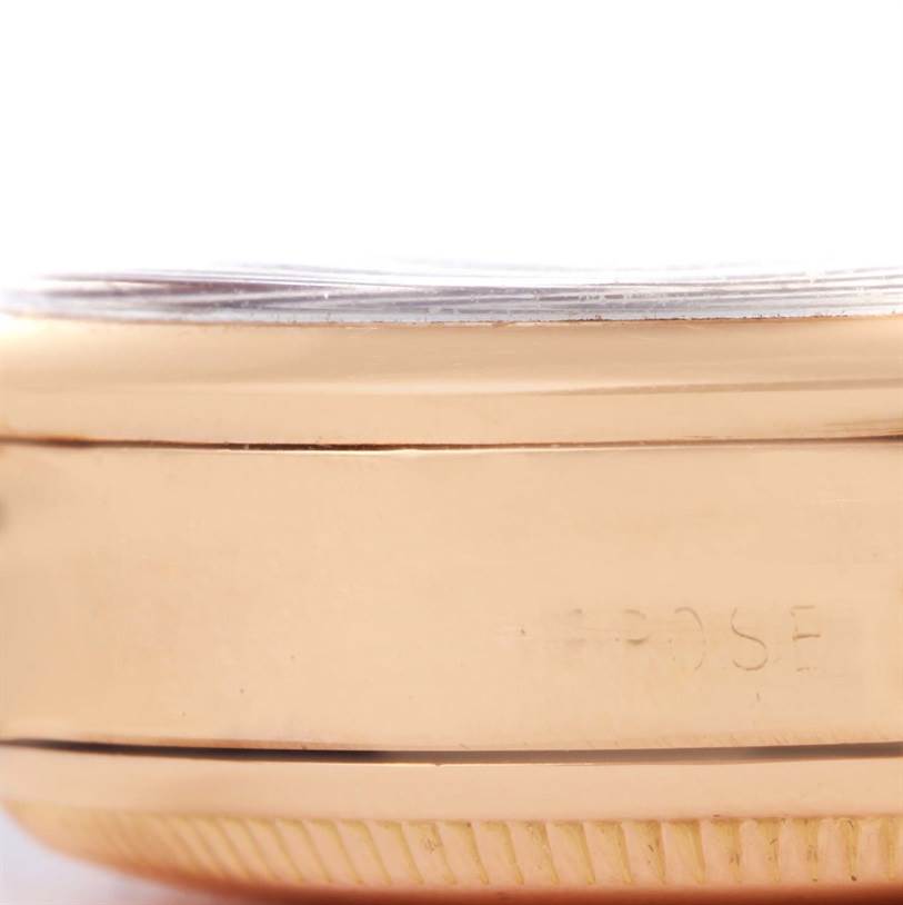 The image shows a close-up, side view of the case and bezel of a Rolex Vintage Collection 6284 Men's Rose Gold Silver Dial 6284 Men's Rose Gold Silver Dial watch.