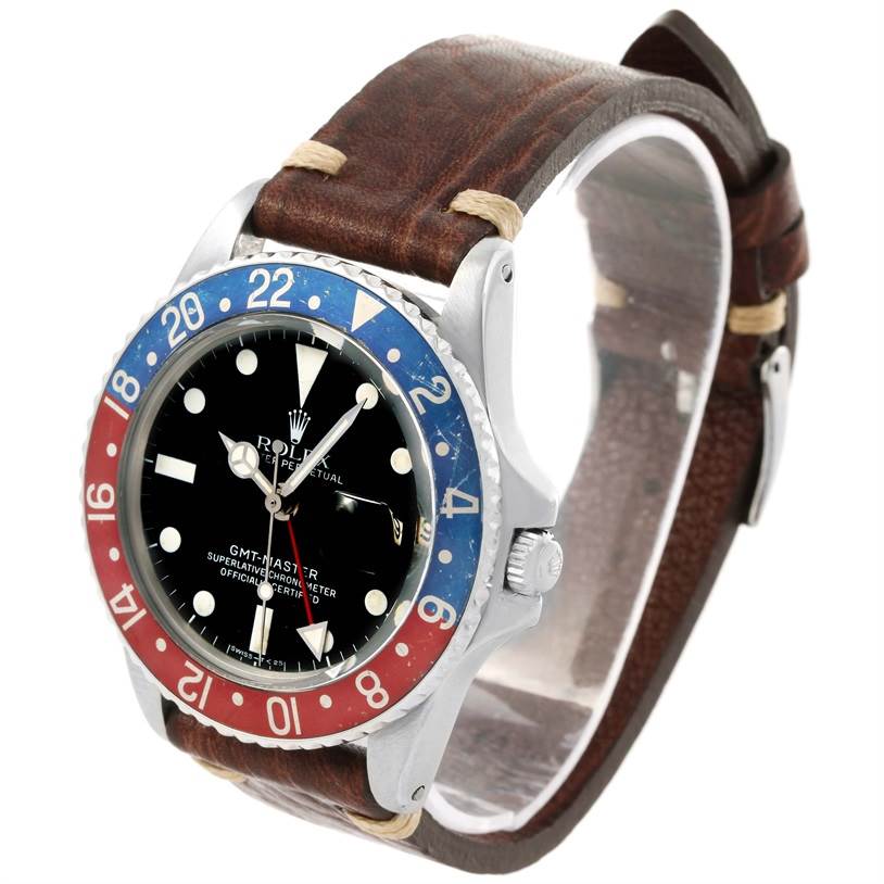 This image shows a side angle of the Rolex Vintage Collection 1675 Men's Stainless Steel Black Dial 1675 Men's Stainless Steel Black Dial GMT-Master watch, displaying the face, bezel, and leather strap.