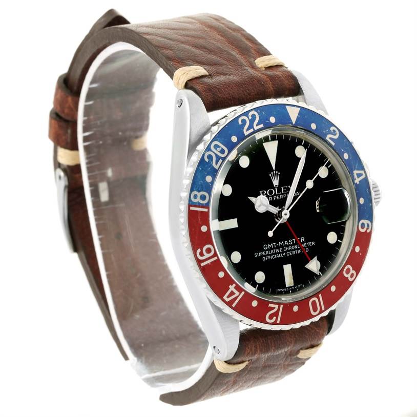 The image shows a side-view angle of the Rolex Vintage Collection 1675 Men's Stainless Steel Black Dial 1675 Men's Stainless Steel Black Dial GMT-Master with a brown leather strap and a red-blue bezel.