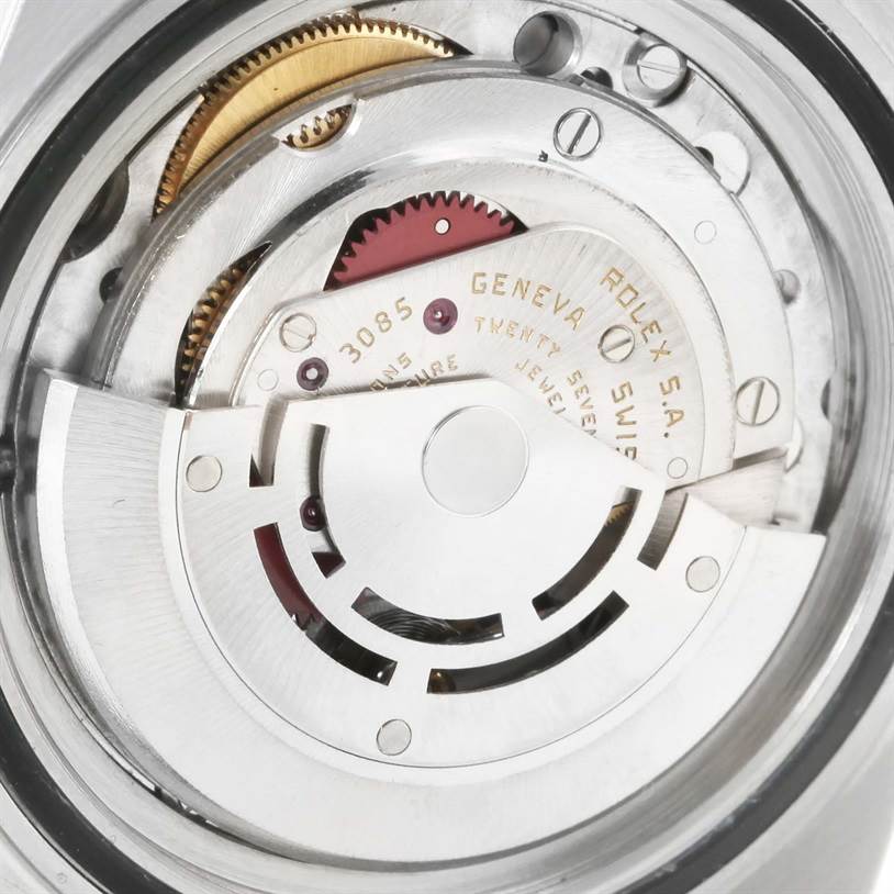 The image shows a close-up view of the movement mechanism of a Rolex Vintage Collection 16760 Stainless Steel Black Dial 16760 Stainless Steel Black Dial watch.