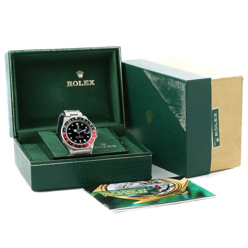The image shows a Rolex Vintage Collection 16760 Stainless Steel Black Dial 16760 Stainless Steel Black Dial model watch, its open box, and an accompanying booklet.
