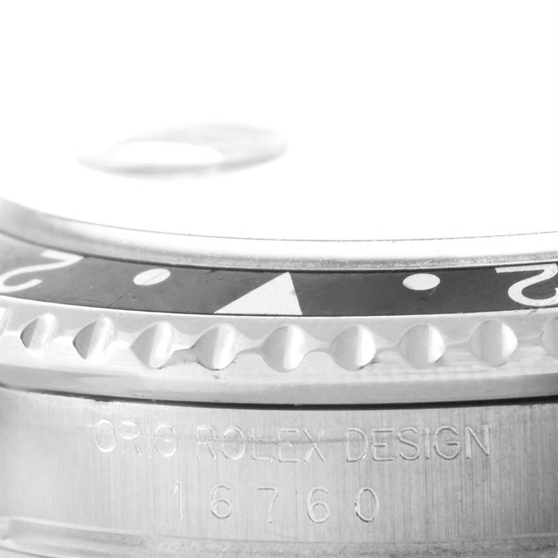 This close-up image shows the bezel and model number (16760) engraving on a Rolex Vintage Collection 16760 Stainless Steel Black Dial 16760 Stainless Steel Black Dial watch.