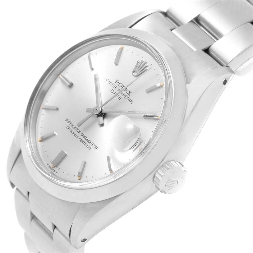 This image shows a close-up, angled view of the Rolex Vintage Collection 1500 Men's Stainless Steel Silver Dial 1500 Men's Stainless Steel Silver Dial watch, displaying the dial, case, crown, and part of the bracelet.