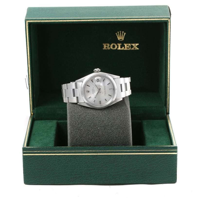 The Rolex Vintage Collection 1500 Men's Stainless Steel Silver Dial 1500 Men's Stainless Steel Silver Dial watch is displayed front-facing in its green box, showing the dial and bracelet.