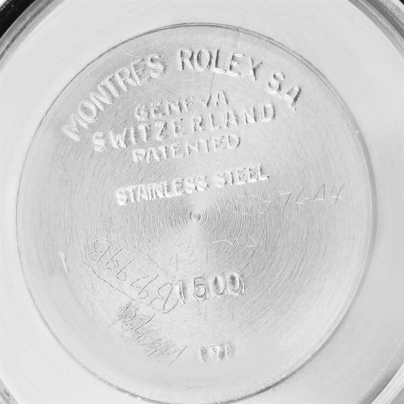 This image shows the case back of the Vintage Collection model by Rolex, focusing on the engraved markings.