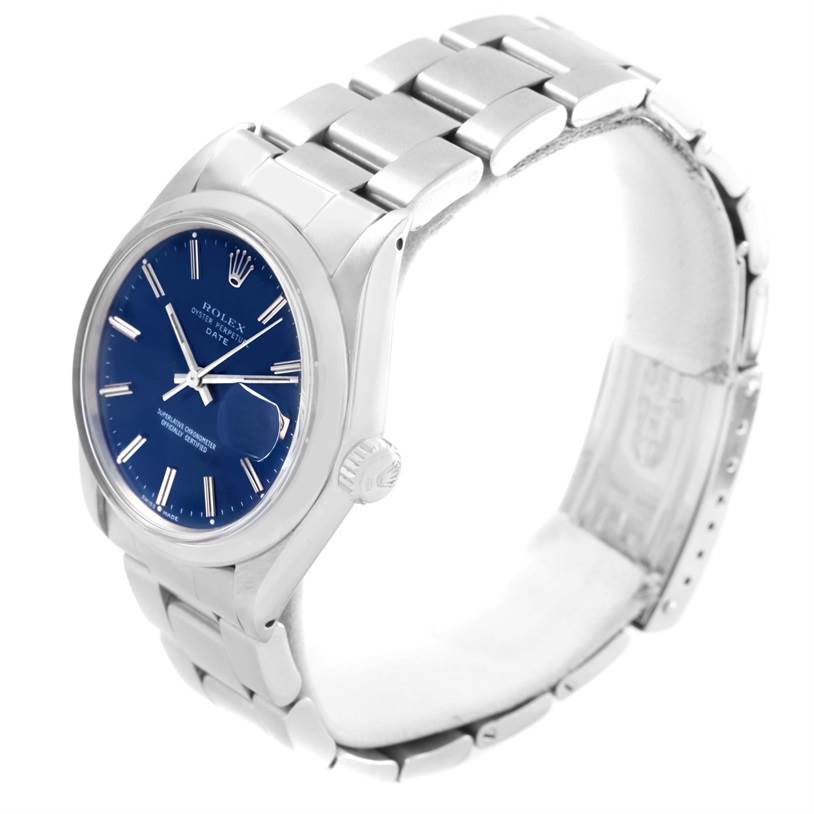 The image shows a Rolex Vintage Collection 1500 Men's Stainless Steel Blue Dial 1500 Men's Stainless Steel Blue Dial model displaying the face, crown, bracelet, and clasp from a slight angle.