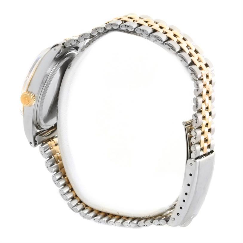 The image shows the side view of the Rolex Vintage Collection 1601 Men's Stainless Steel Silver Dial 1601 Men's Stainless Steel Silver Dial model, focusing on the crown, case, and two-tone metal bracelet.