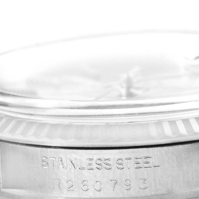 This image shows a close-up of the case side of a Rolex Vintage Collection 16014 Men's Stainless Steel Silver Dial 16014 Men's Stainless Steel Silver Dial watch, highlighting the stainless steel material and model number.