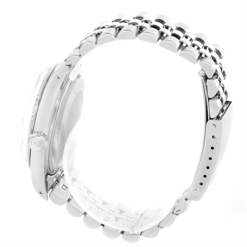 The image shows a side view of a Rolex Vintage Collection 16014 Men's Stainless Steel Silver Dial 16014 Men's Stainless Steel Silver Dial watch, focusing on the case, crown, and bracelet.