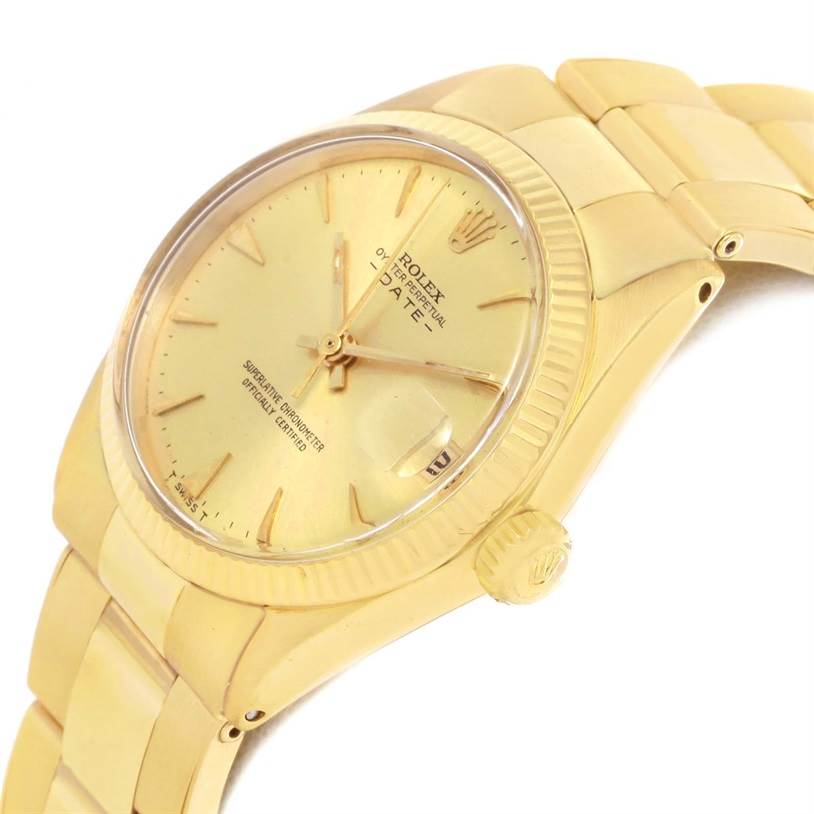 This image shows a close-up angled view of the Rolex Vintage Collection 6627 Yellow Gold Champagne Dial 6627 Yellow Gold Champagne Dial watch, highlighting its face, crown, and part of the bracelet.