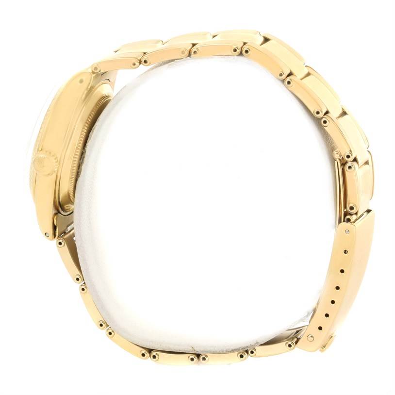 Side view of a Vintage Collection model by Rolex, showcasing the bracelet, clasp, and crown.