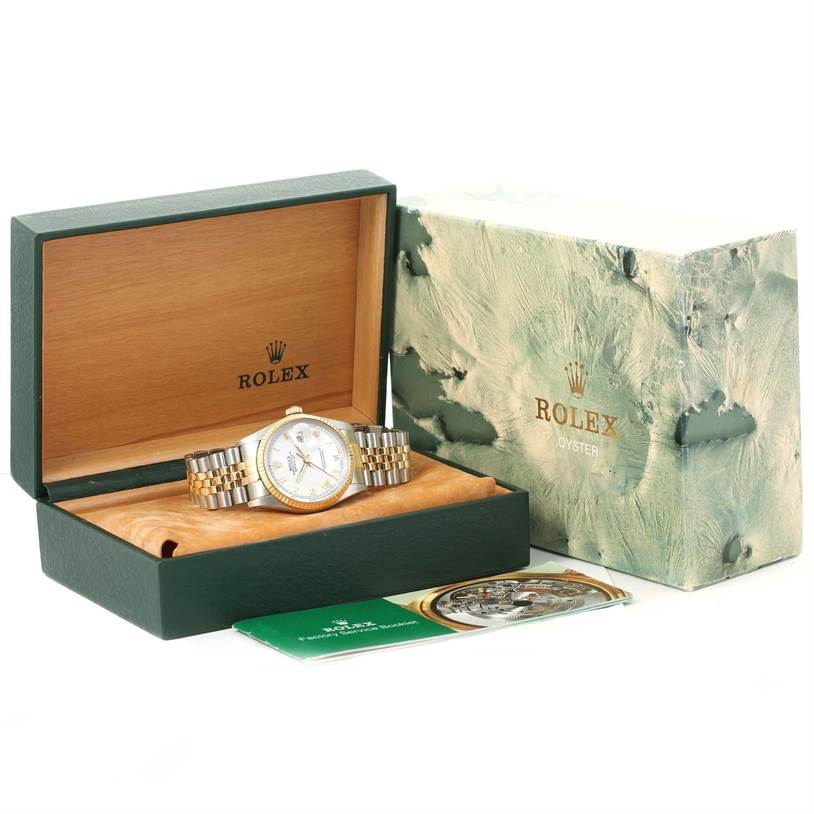 The image shows a Rolex Vintage Collection 16013 Men's Stainless Steel White Dial 16013 Men's Stainless Steel White Dial watch in its open box, along with accompanying booklets and outer packaging.
