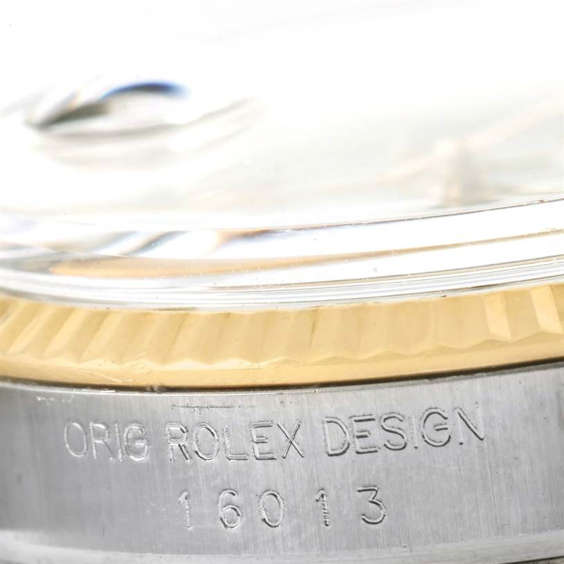The image shows a close-up of the model number "16013" and the engraved text "ORIG ROLEX DESIGN" on a Rolex Vintage Collection 16013 Men's Stainless Steel White Dial 16013 Men's Stainless Steel White Dial watch case.