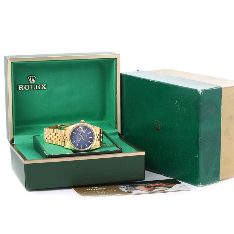 The image shows a Rolex Vintage Collection 15037 Men's Yellow Gold Blue Dial 15037 Men's Yellow Gold Blue Dial watch with a gold band and blue face in an open green Rolex box, with outer packaging and documentation visible.