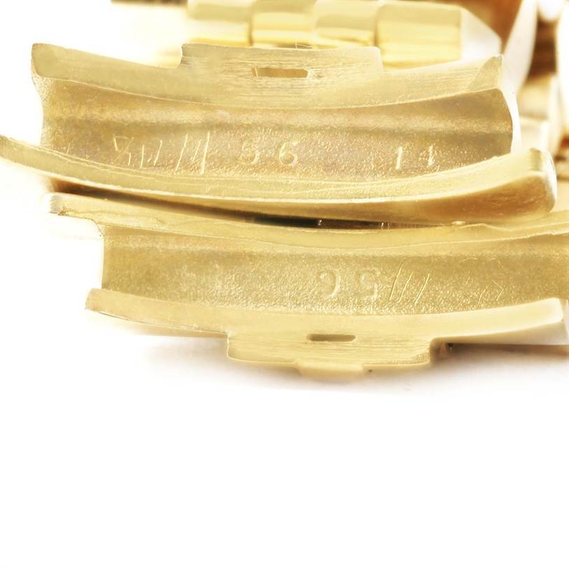 The image shows a close-up of the gold links and clasp mechanism of the Rolex Vintage Collection 15037 Men's Yellow Gold Blue Dial 15037 Men's Yellow Gold Blue Dial watch.