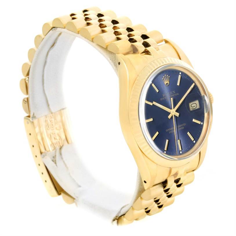The image shows a side view of the Rolex Vintage Collection 15037 Men's Yellow Gold Blue Dial 15037 Men's Yellow Gold Blue Dial watch, highlighting its gold band and blue dial.