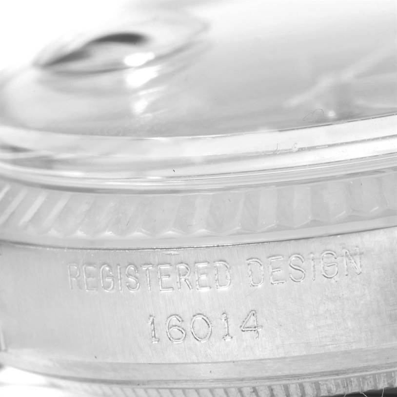Close-up angle showing the engraved serial number and bezel of the Rolex Vintage Collection 16014 Men's Stainless Steel Black Dial 16014 Men's Stainless Steel Black Dial model 16014.
