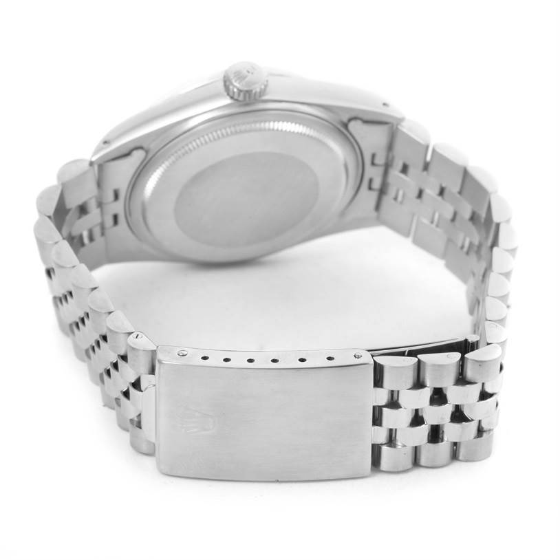 The image shows the case back, clasp, and part of the bracelet of the Rolex Vintage Collection 16014 Men's Stainless Steel Black Dial 16014 Men's Stainless Steel Black Dial model watch at an angled rear view.