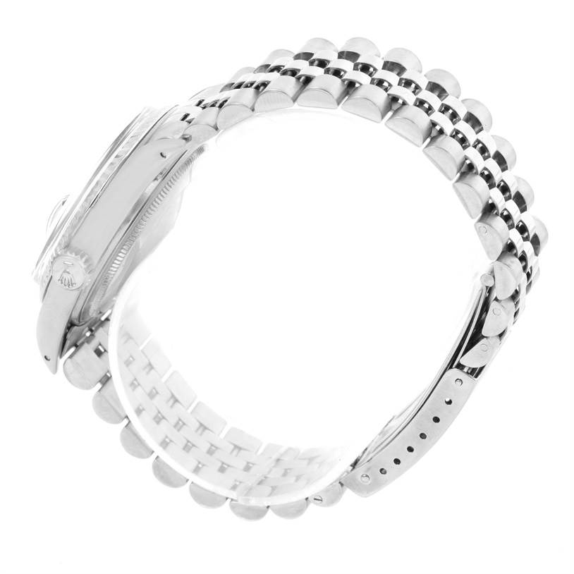 The image shows a side view of the Rolex Vintage Collection 16014 Men's Stainless Steel Black Dial 16014 Men's Stainless Steel Black Dial model, focusing on the case, crown, and bracelet.