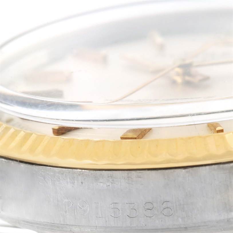 The image shows a close-up side view of the Rolex Vintage Collection 1601 Men's Stainless Steel Silver Dial 1601 Men's Stainless Steel Silver Dial watch, featuring the bezel, crystal, and partial dial.