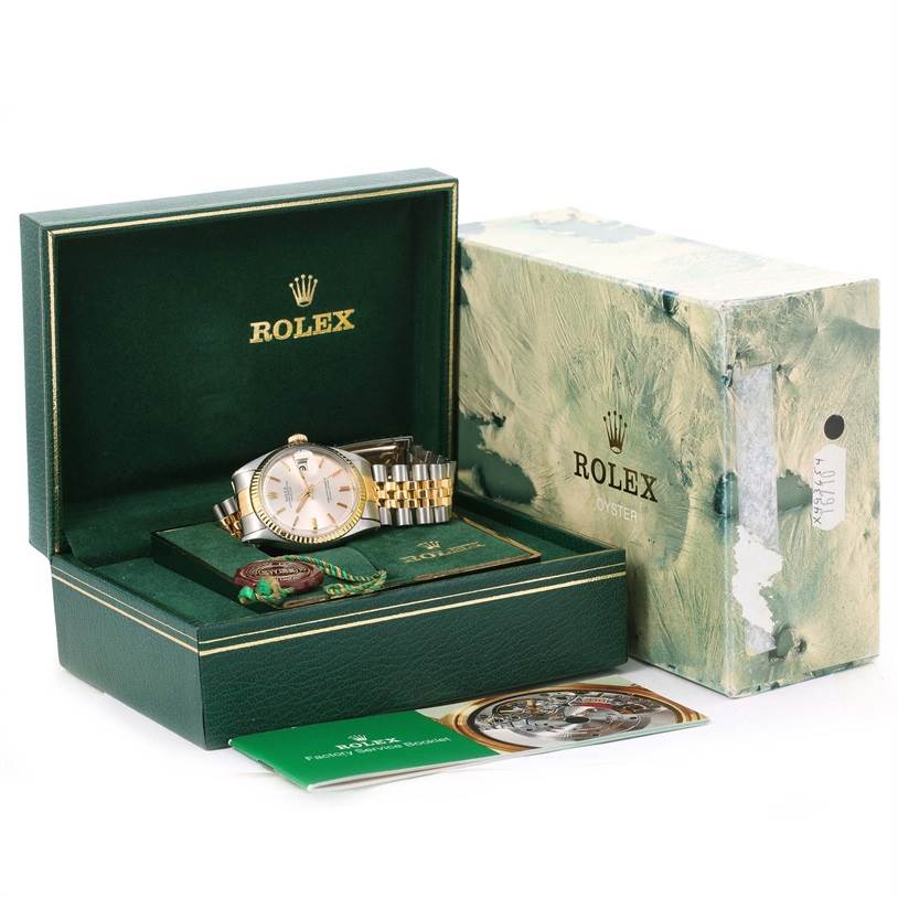 The image shows a Rolex Vintage Collection 1601 Men's Stainless Steel Silver Dial 1601 Men's Stainless Steel Silver Dial model watch inside its branded box with accompanying accessories and manuals.