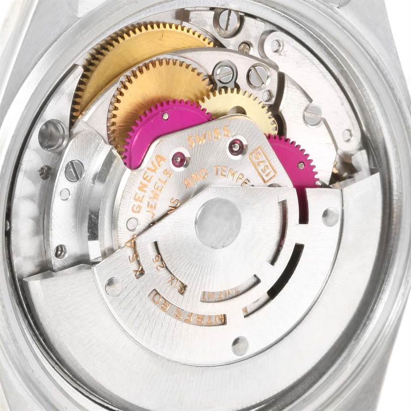 This image shows the internal movement mechanism of the Vintage Collection model by Rolex, highlighting gears and mechanical parts.