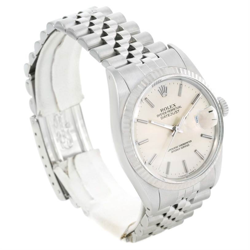 The image shows a side angle view of the Rolex Vintage Collection 16014 Men's Stainless Steel Silver Dial 16014 Men's Stainless Steel Silver Dial Datejust watch, focusing on the face and bracelet.