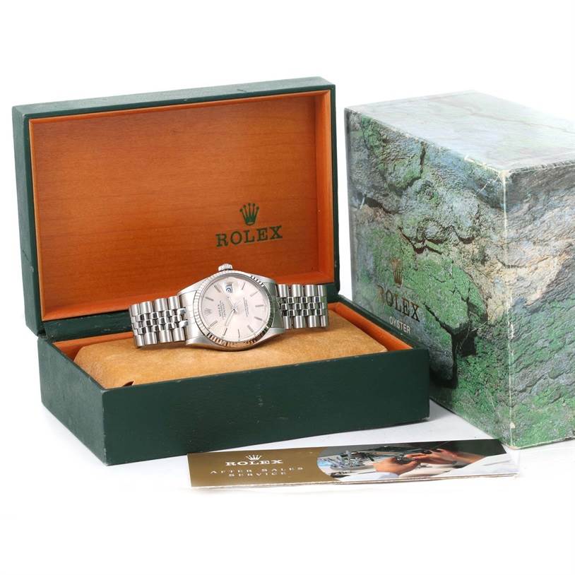 The image shows a Rolex Vintage Collection 16014 Men's Stainless Steel Silver Dial 16014 Men's Stainless Steel Silver Dial watch in its box with the outer packaging and a brochure.
