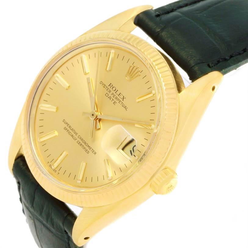 The Vintage Collection Rolex watch is shown at a slight angle, highlighting the gold dial, case, crown, and part of the black leather strap.