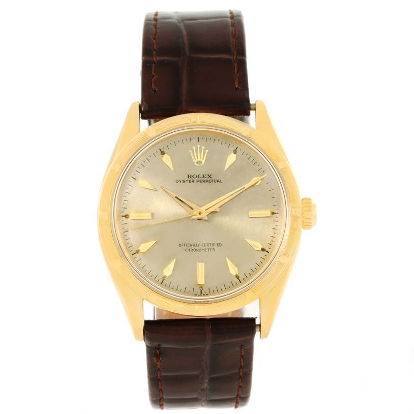 The Rolex Vintage Collection 6569 Men's Yellow Gold Brown Dial 6569 Men's Yellow Gold Brown Dial model is shown from a front angle, displaying its dial, hands, crown, and leather strap.